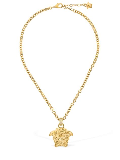 versace crystal charm|Versace gold necklace.